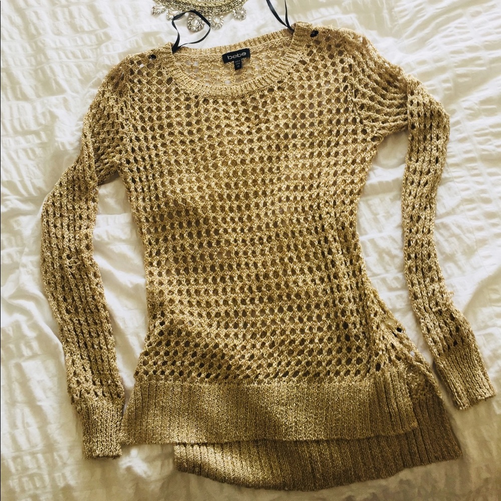 BeBe shimmering Sweater neat. Size XS.